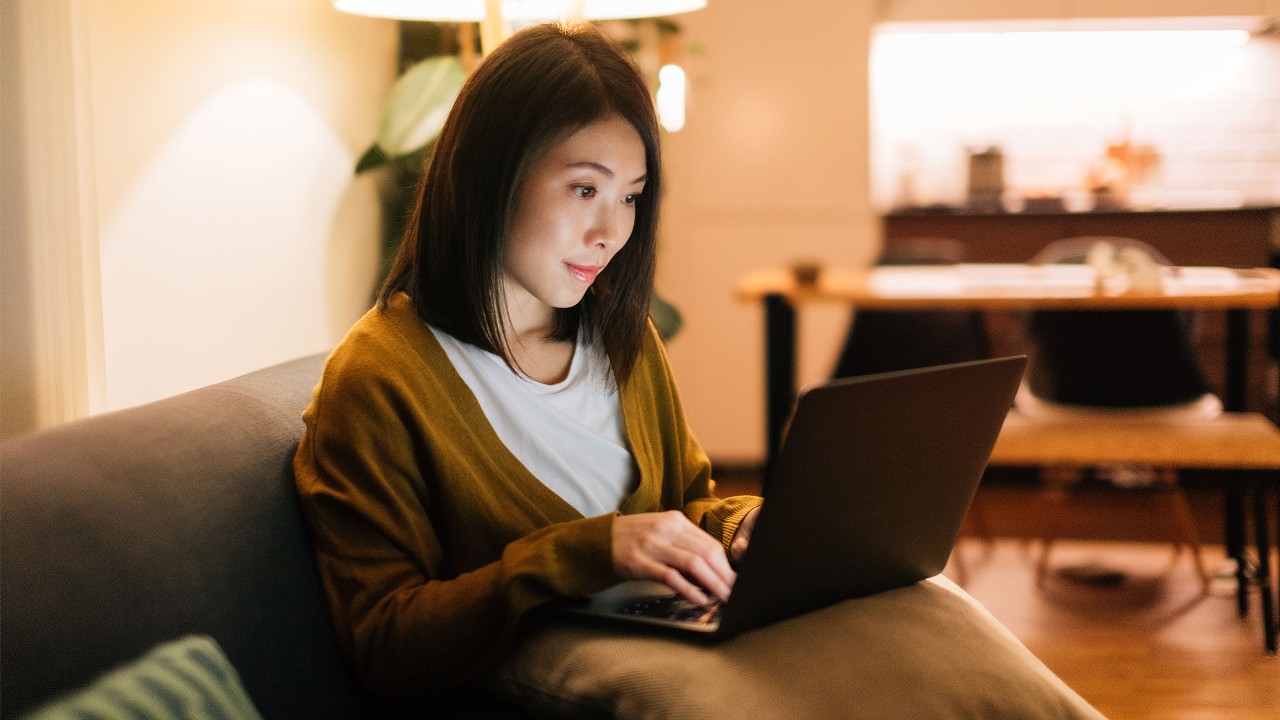 Woman working at home; image used for E-Form HKSAR Cash Payout Scheme